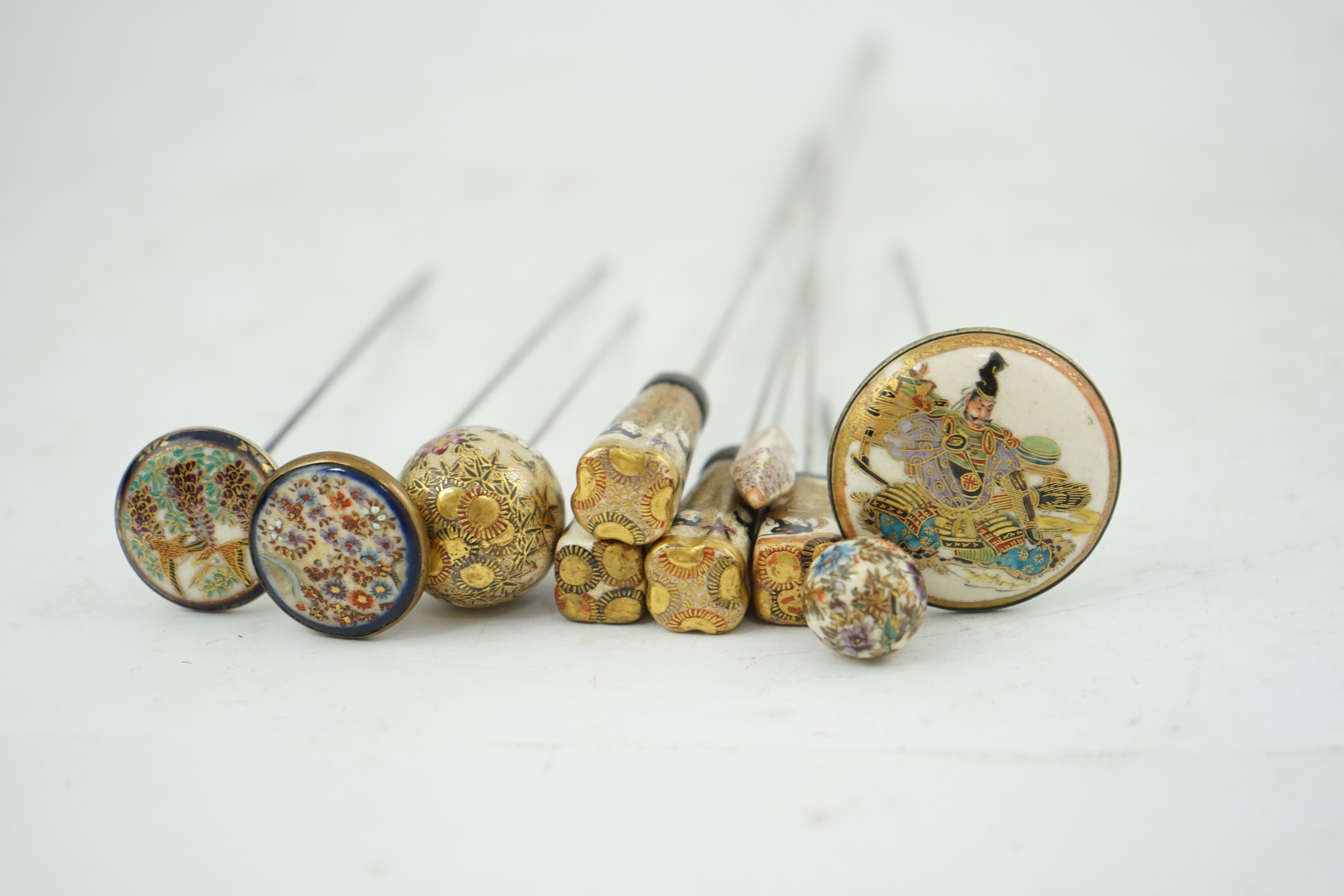 A group of ten Japanese Satsuma topped hair pins, early 20th century